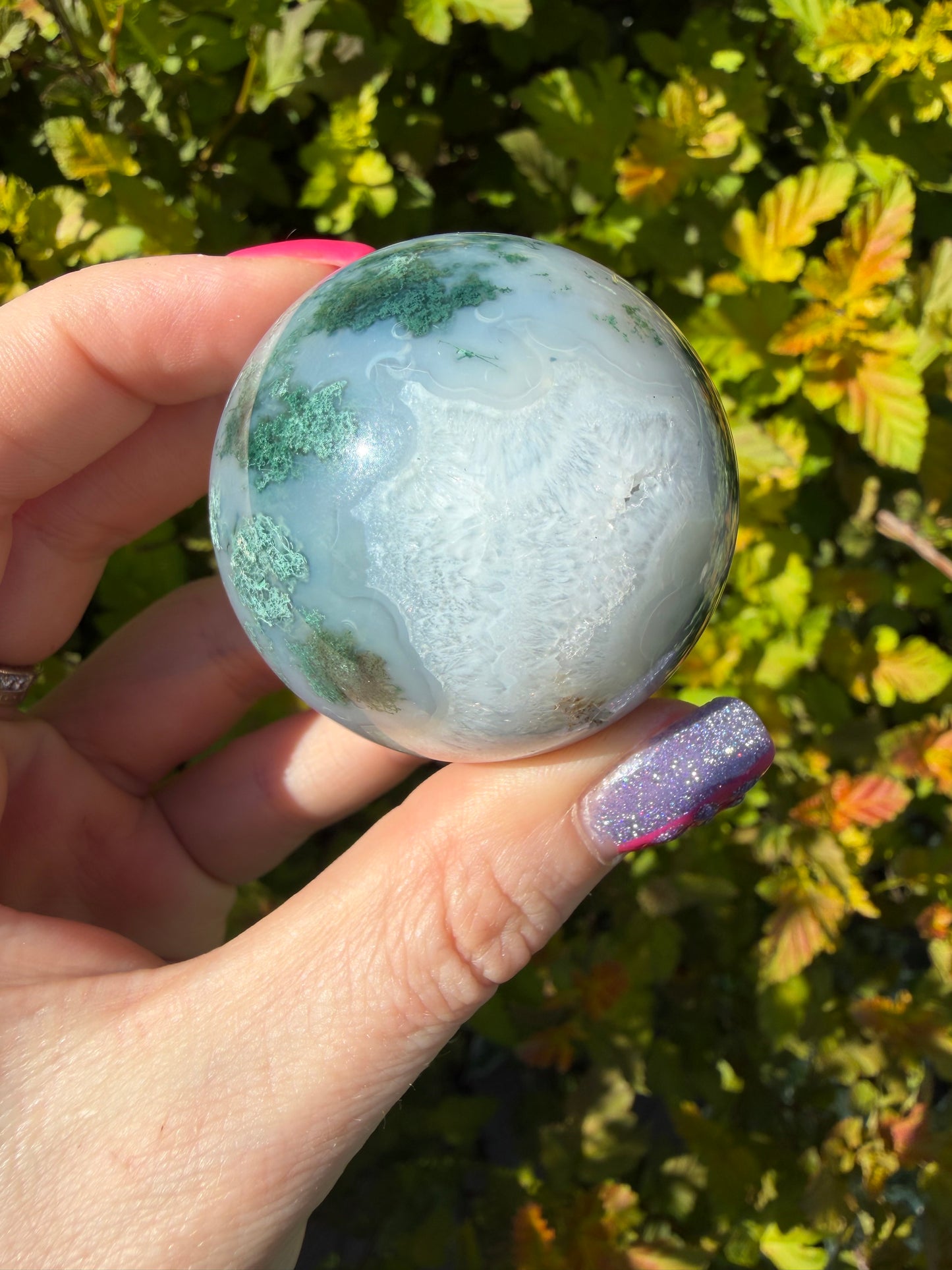 Moss Agate sphere on Butterfly Stand