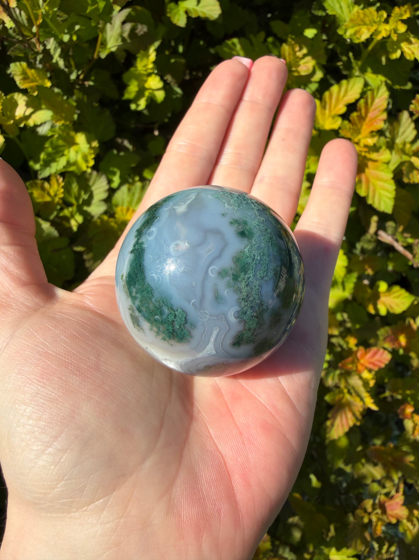 Moss Agate sphere on Butterfly Stand
