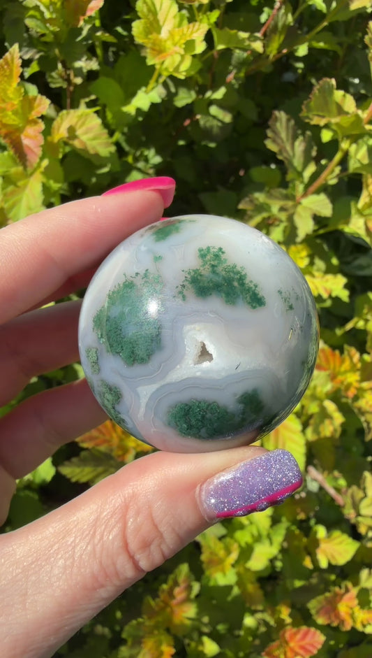 Moss Agate sphere on Butterfly Stand